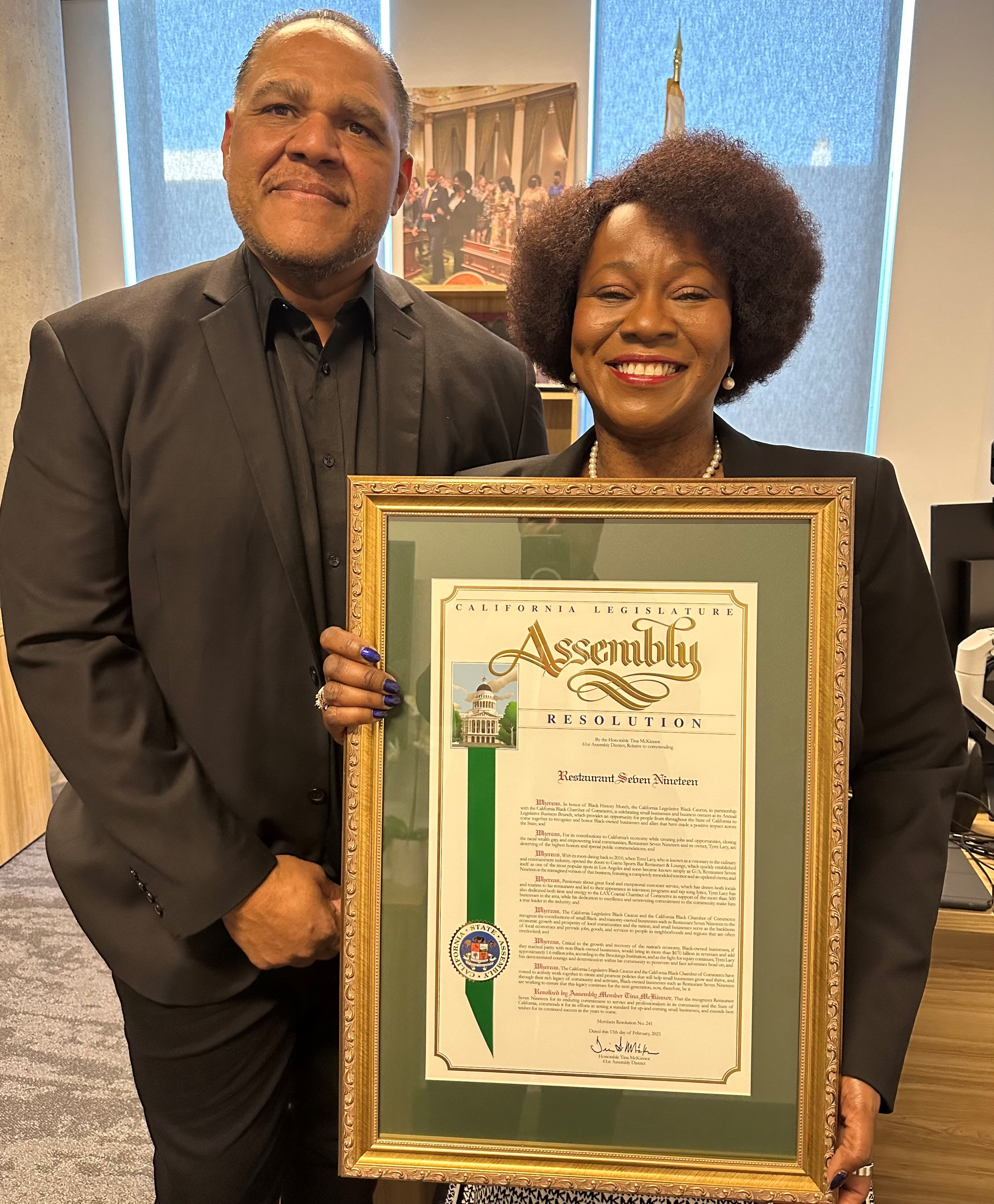 Assemblymember Tina McKinnor (D – Inglewood) recognizes Tyrei Lacy, owner of Restaurant Seven Nineteen as the 2023 Black Small Business of the Year.