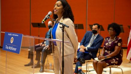 Guest speaker, speaking at podium