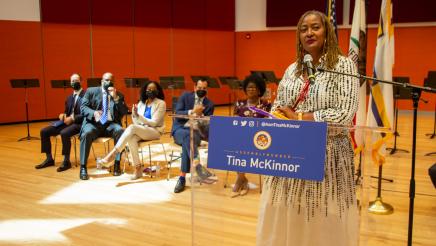 Guest speaker, speaking at podium