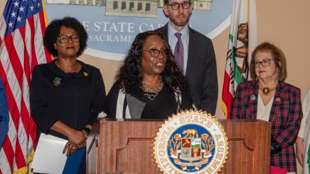 Yvonne Wheeler, President of the Los Angeles County Federation of Labor at podium