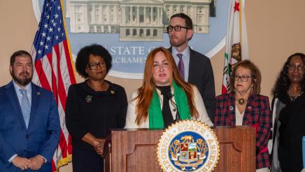 Samantha Corbin, We Said Enough, at podium