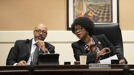 Asm. McKinnor conferring with staffer
