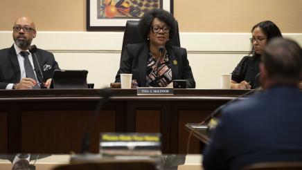 Asm. McKinnor at microphone, speaking