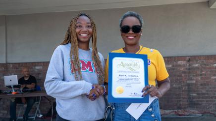 Asm. McKinnor awarding scholarship to student
