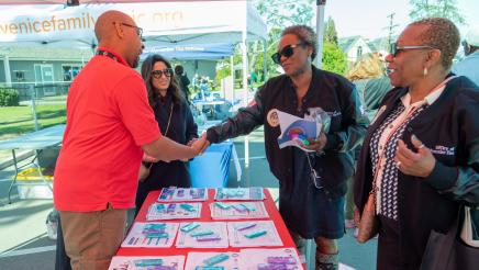 Asm. McKinnor greeting Cedars Sinai staffers