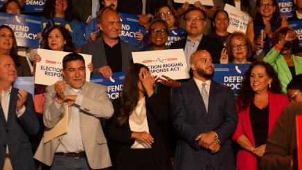 Asm. McKinnor, other legislators and supporters, some holding signs