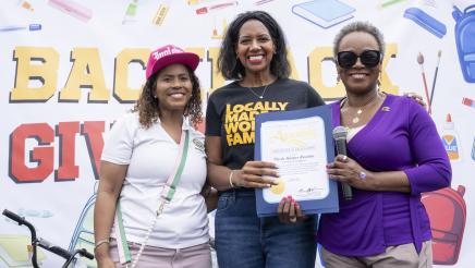 Asm. McKinnor and Councilwoman Faulk presenting Nicole Harper Rawlins with award