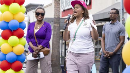 Councilwoman Faulk at microphone, speaking