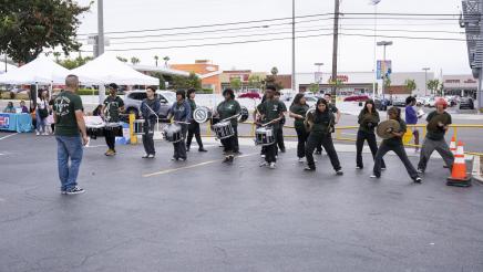 School band members playing instruments
