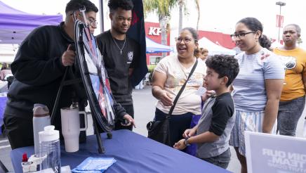 LA Clippers staffers hosting spinning wheel contest