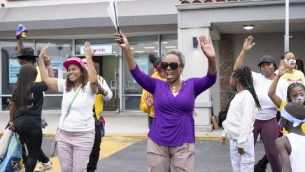 Asm. McKinnor and Councilwoman Faulk dancing with others